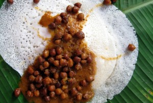 Appam with fish stew